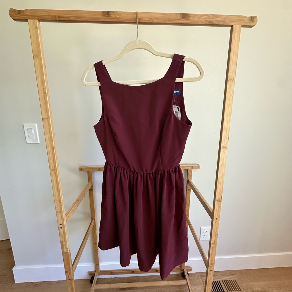 American apparel junior size medium maroon dress with button down the back.